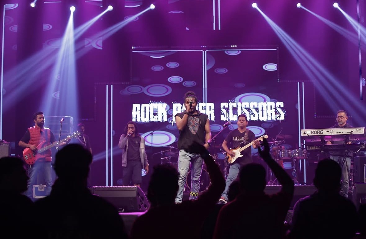 Rock Paper Scissors performing live on stage